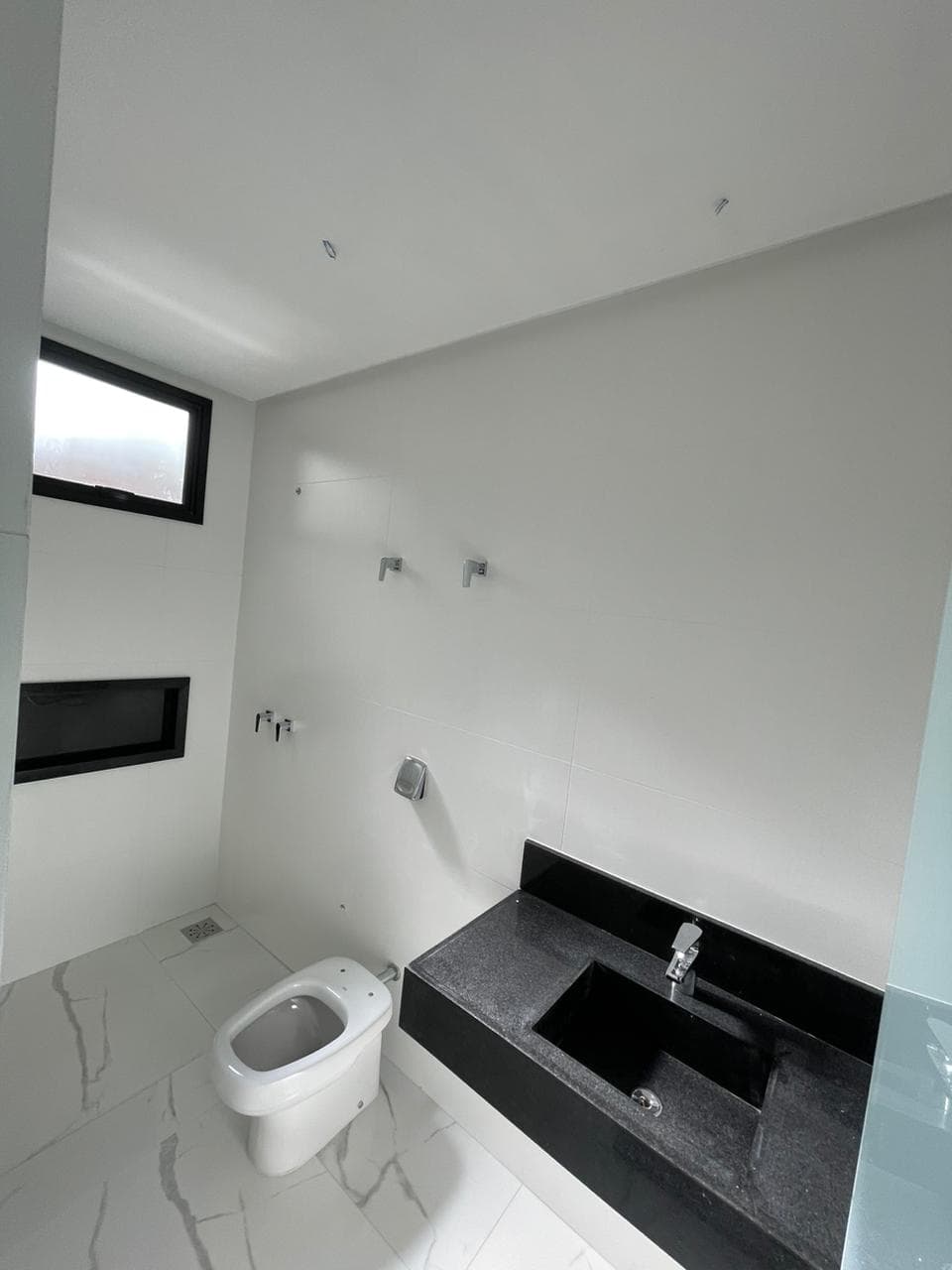 Casa Térrea em Condominio 4 suites plenas - Portal do Sol Garden